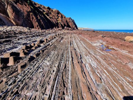 Unusual rock structure against the sea water background, coastline, interesting geological object at Hallett Cove, Australia