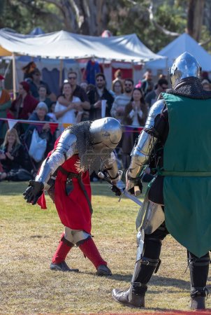 Photo for Paracombe, South Australia - 05.05.2024: Medieval Fair, community entertaining event, knights jousting, skill at arms competitions, and battles with knights in armor on horses, medieval adventure. - Royalty Free Image