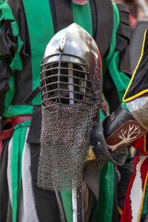 Photo for Elements of medieval iron knight armor for battle, helmet, spaulders, pouldrons, vambraces, gauntlets. Medieval fair. High quality photo - Royalty Free Image