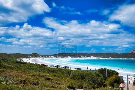 Photo for The white sand beach at Lucky Bay in Cape Le Grand National Park, Western Australia, with cars and rvs parked on the beach - Royalty Free Image