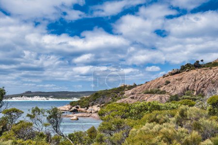Photo for Eroded granite rocks, coastal vegetation and dunes at Lucky Bay in Cape Le Grand National Park, Western Australia. - Royalty Free Image