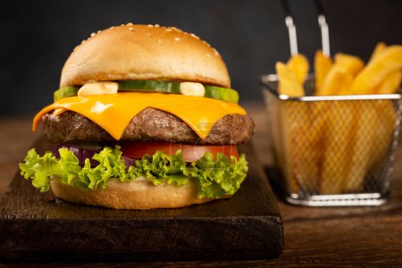 Photo for Burger with french fries. - Royalty Free Image