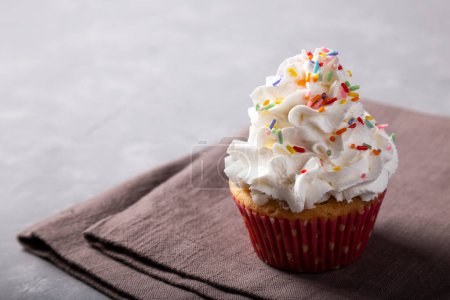 Photo for Tasty party cupcakes on the table. Cupcakes with whipped cream. - Royalty Free Image