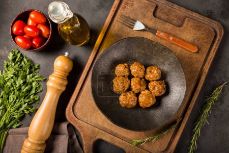 Photo for Homemade meatballs roasted on the table. - Royalty Free Image