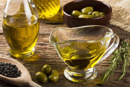 Photo for Olive oil. Containers with virgin olive oil and olives. - Royalty Free Image
