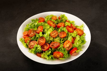 Photo for Fresh salad with lettuce and tomato. - Royalty Free Image
