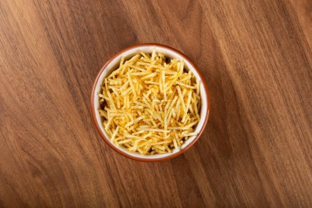 Photo for Bowl with straw potatoes on the table. - Royalty Free Image