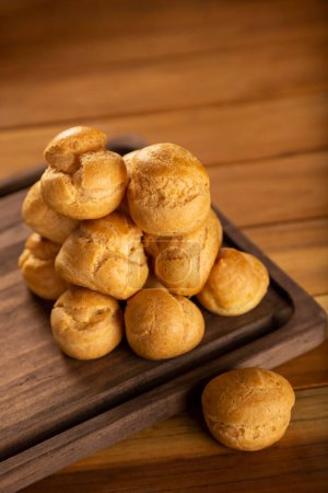 Photo for Delicious profiteroles on the table. - Royalty Free Image