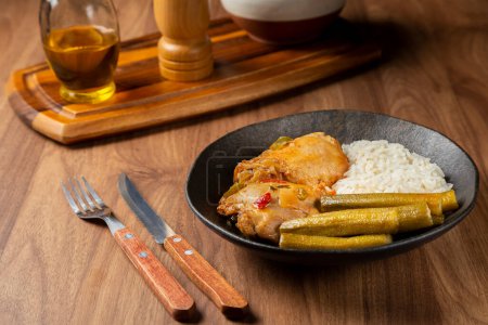 Photo for Chicken with okra and rice. Typical Brazilian dish. - Royalty Free Image