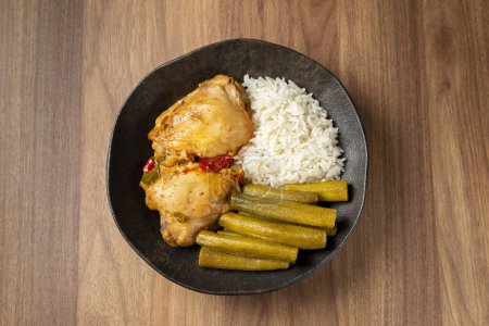 Photo for Chicken with okra and rice. Typical Brazilian dish. - Royalty Free Image