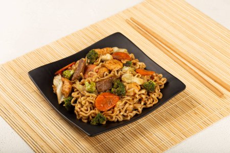 Photo for Yakisoba noodles. Yakisoba dish with meat, chicken and vegetables. - Royalty Free Image