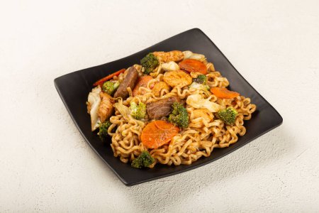 Photo for Yakisoba noodles. Yakisoba dish with meat, chicken and vegetables. - Royalty Free Image