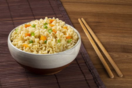 Photo for Bowl with instant noodles on the table. - Royalty Free Image