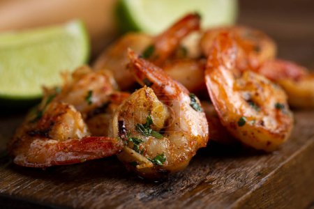 Photo for Delicious grilled prawns on wooden background. - Royalty Free Image