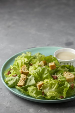 Photo for Caesar salad with croutons and bacon. - Royalty Free Image