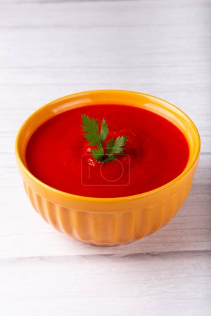 Delicious homemade tomato soup in bowl.