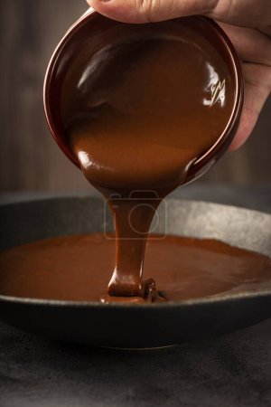Foto de Delicioso ganache de chocolate. Chocolate caliente. - Imagen libre de derechos