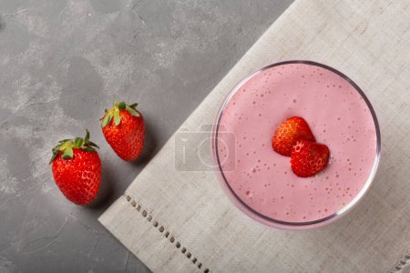 Photo for Delicious strawberry mousse in glass goblet. - Royalty Free Image