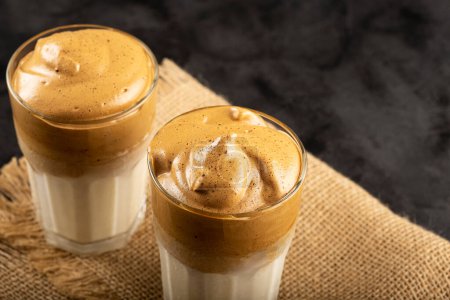 Photo for Iced Dalgona Coffee, glass with milk and coffee cream. - Royalty Free Image