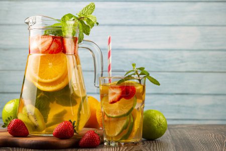 Photo for Water flavored with fresh summer fruit. - Royalty Free Image