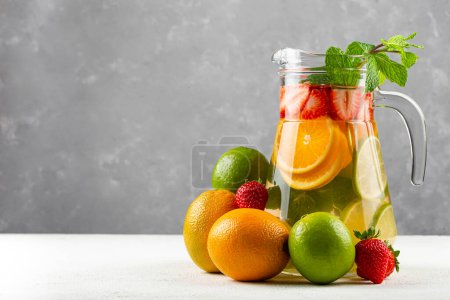 Photo for Water flavored with fresh summer fruit. - Royalty Free Image
