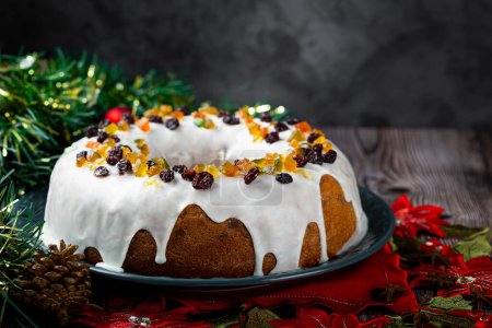 Photo for Christmas cake with fondant and candied fruit. - Royalty Free Image