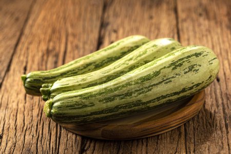 Photo for Green italian zuchini on the table. - Royalty Free Image