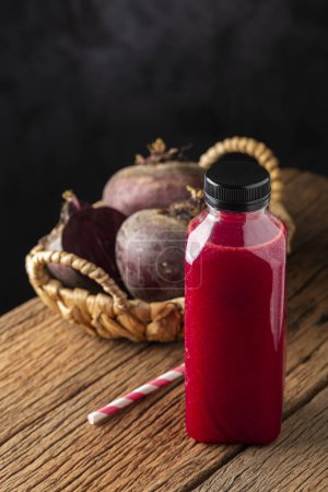 Photo for Red beet juice in plastic bottle. - Royalty Free Image