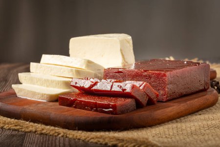 Guava jam with sliced cheese on the table. Romeo e Julieta, a typical Brazilian sweet.