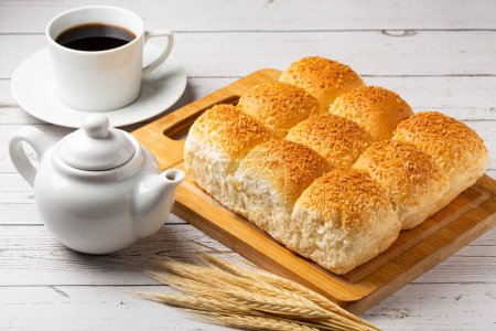 Photo for Breakfast table with coconut bread. - Royalty Free Image