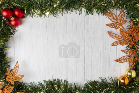 Photo for Christmas ornaments on wooden table. Top view with copy space. - Royalty Free Image
