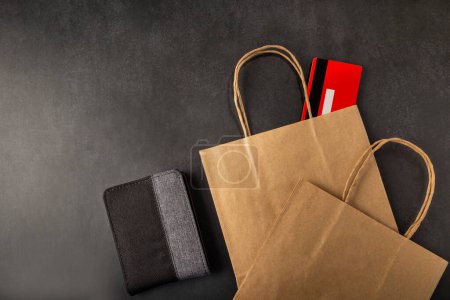 Photo for Paper bag, wallet and credit card. - Royalty Free Image
