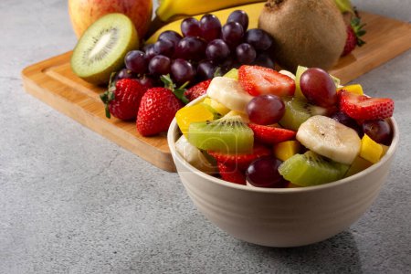 Photo for Fruit salad in bowl on the table. - Royalty Free Image