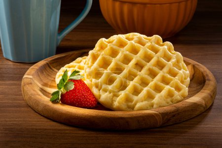 Photo for Delicious waffles. Plate with baked waffles on the table. - Royalty Free Image