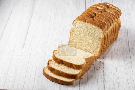 Photo for Sliced bread loaf on the table. - Royalty Free Image