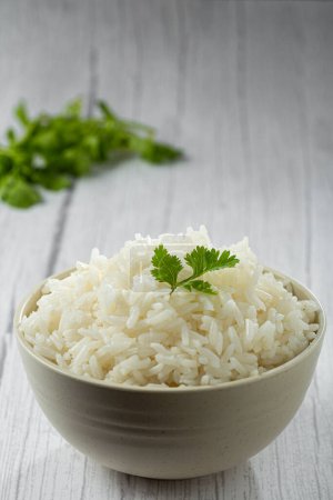 Photo for Bowl with cooked rice on the table. - Royalty Free Image