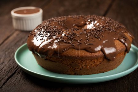 Photo for Homemade chocolate cake with chocolate sauce topping. - Royalty Free Image