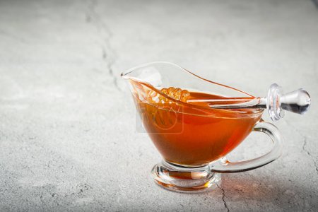 Photo for Honey in glass bowl on the table. - Royalty Free Image
