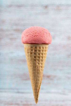 Photo for Tasty strawberry ice cream cone. - Royalty Free Image