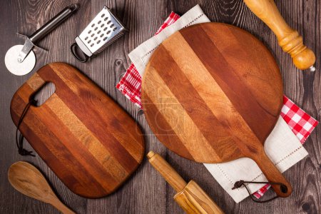 Photo for Empty pizza board on rustic wooden table. Top view image. - Royalty Free Image