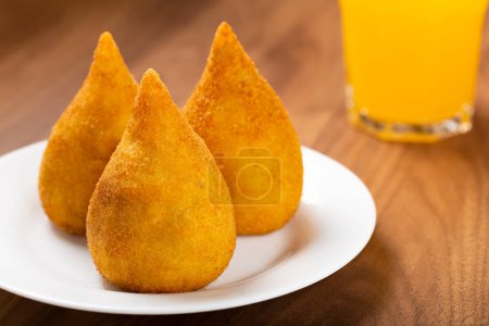 Photo for Coxinha of chicken, Traditional brazilian snack. - Royalty Free Image