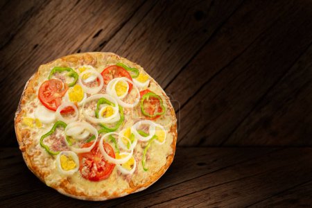 Téléchargez les photos : Pizza à saveur portugaise. Pizza traditionnelle brésilienne. - en image libre de droit