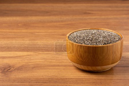 Photo for Chia seed in wooden bowl. - Royalty Free Image