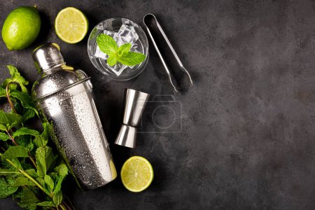 Photo for Ingredients for mojito drink. Lemon, mint and bar ware. - Royalty Free Image