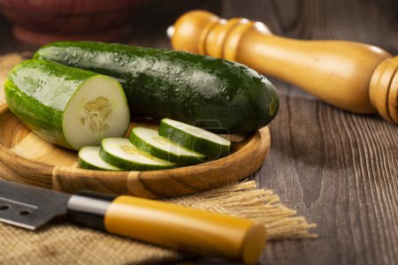 Photo for Sliced fresh cucumber on the table. - Royalty Free Image