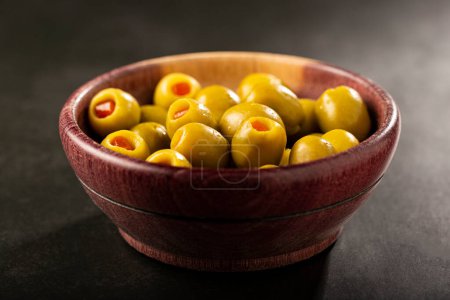 Photo for Stuffed green olives in a bowl. - Royalty Free Image
