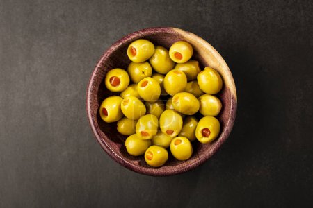 Photo for Stuffed green olives in a bowl. - Royalty Free Image