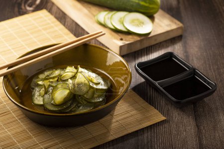 Sunomono. Plate with Japanese cucumber salad.