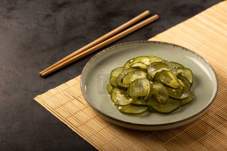 Photo for Sunomono. Plate with Japanese cucumber salad. - Royalty Free Image