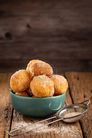 Photo for Bowl with rain cookies. In Brazil known as "bolinho de chuva". - Royalty Free Image